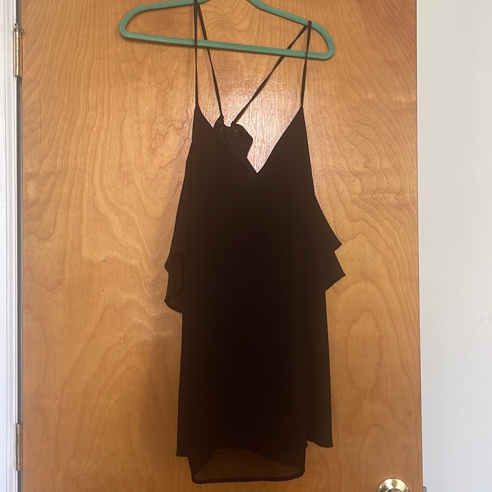 Black cocktail dress with sheer sleeves